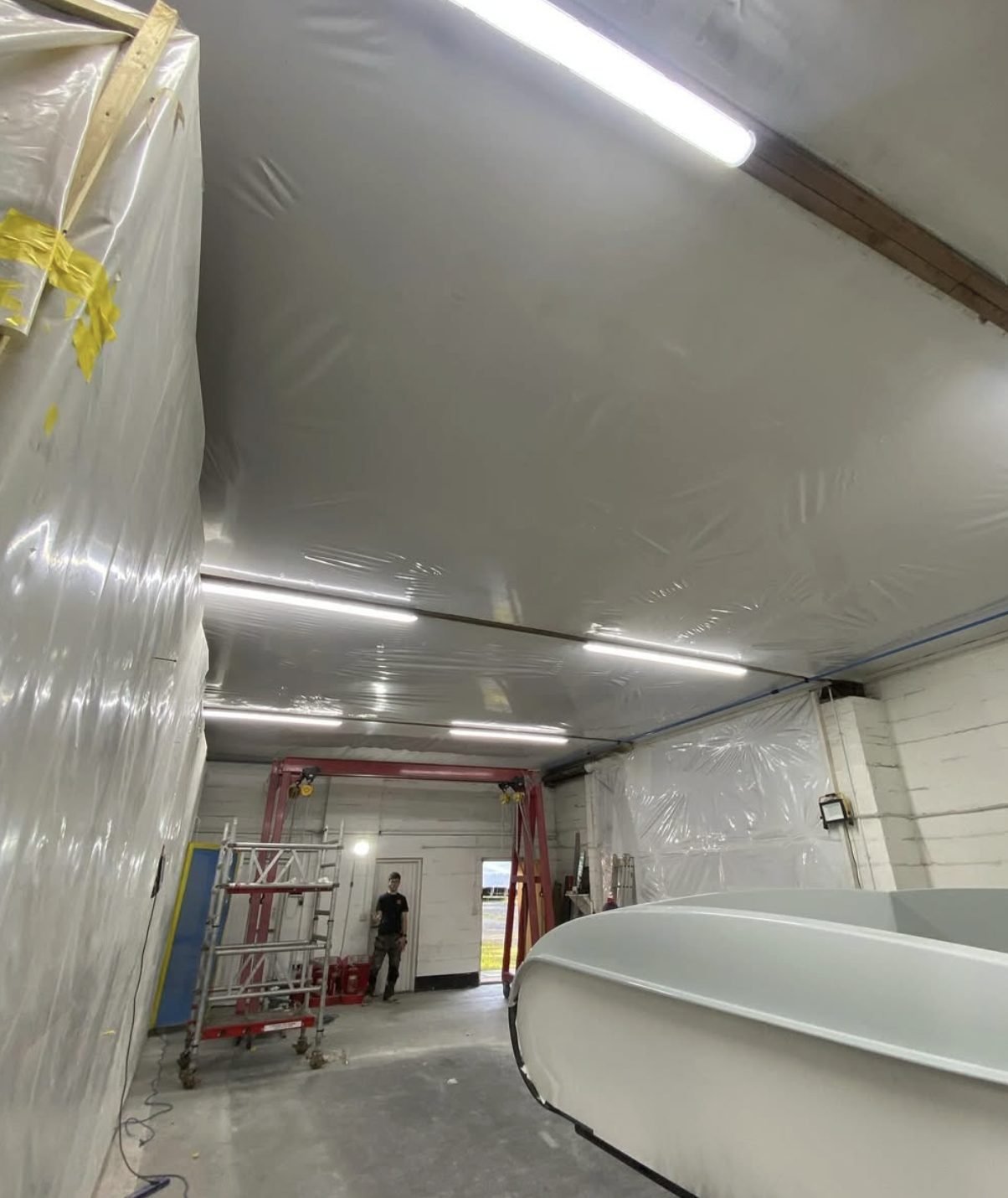 LED batten lighting installed across the ceiling of a commercial unit