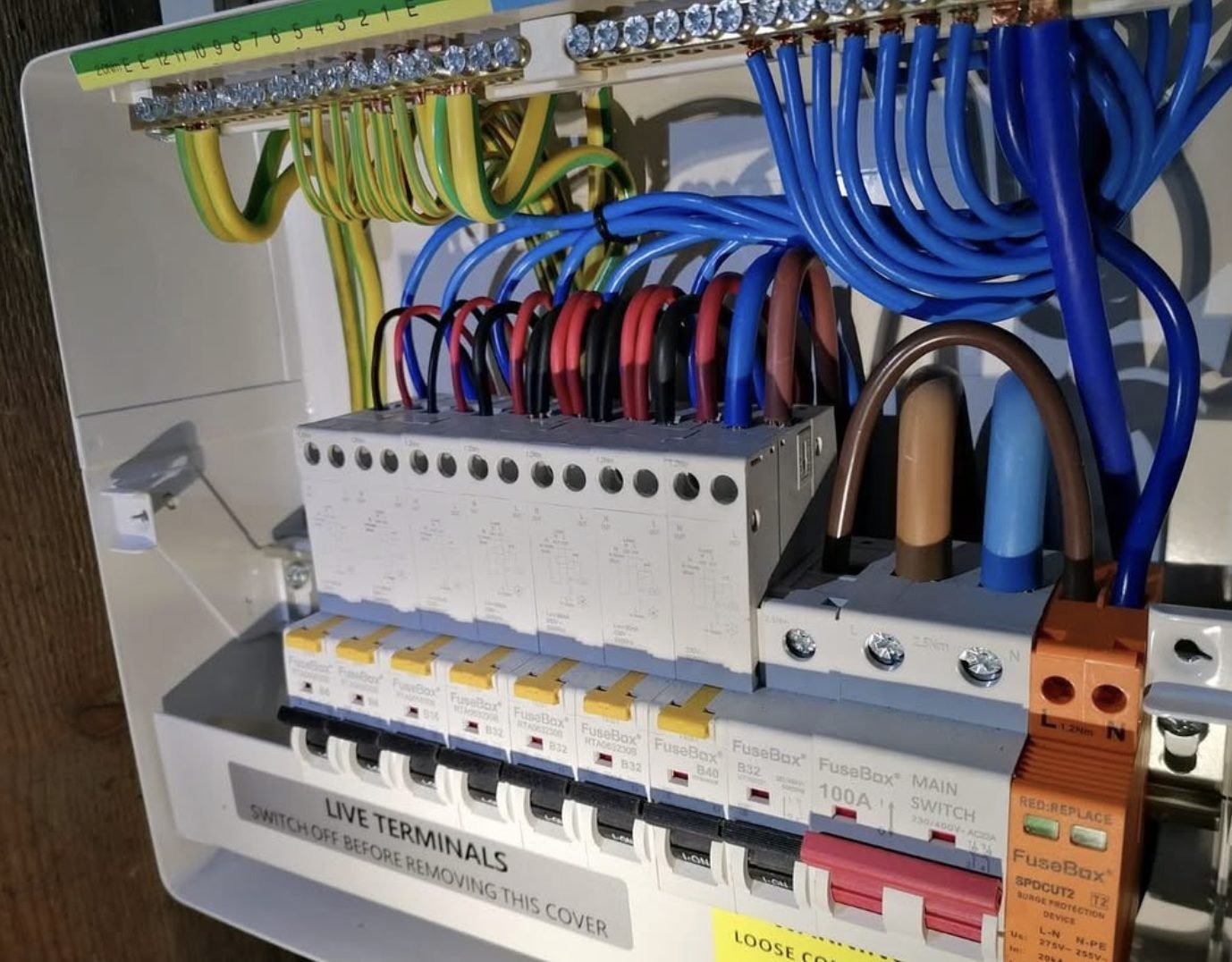 Finished consumer unit with individual RCBOs and neatly dressed cabling